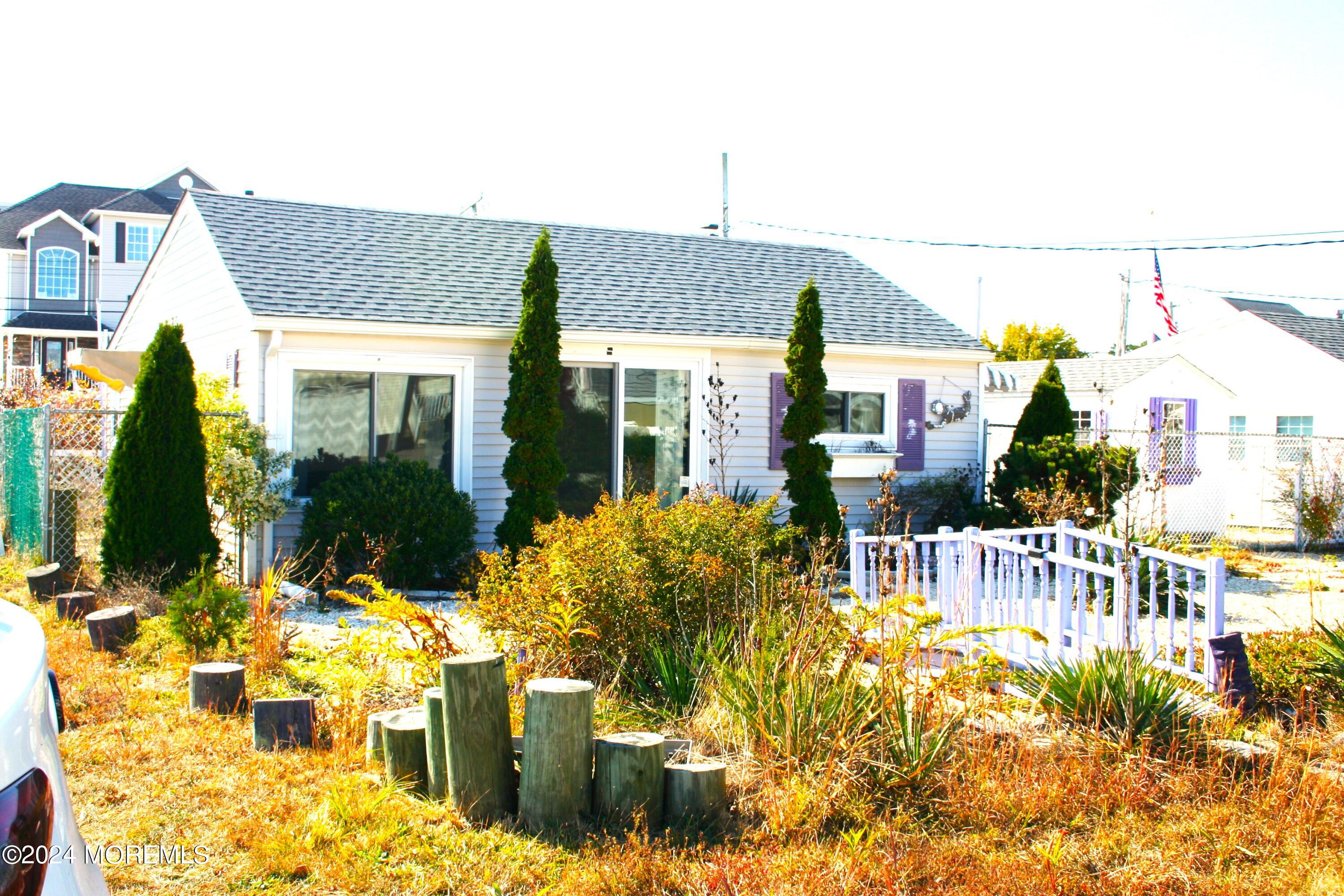 a view of houses with yard