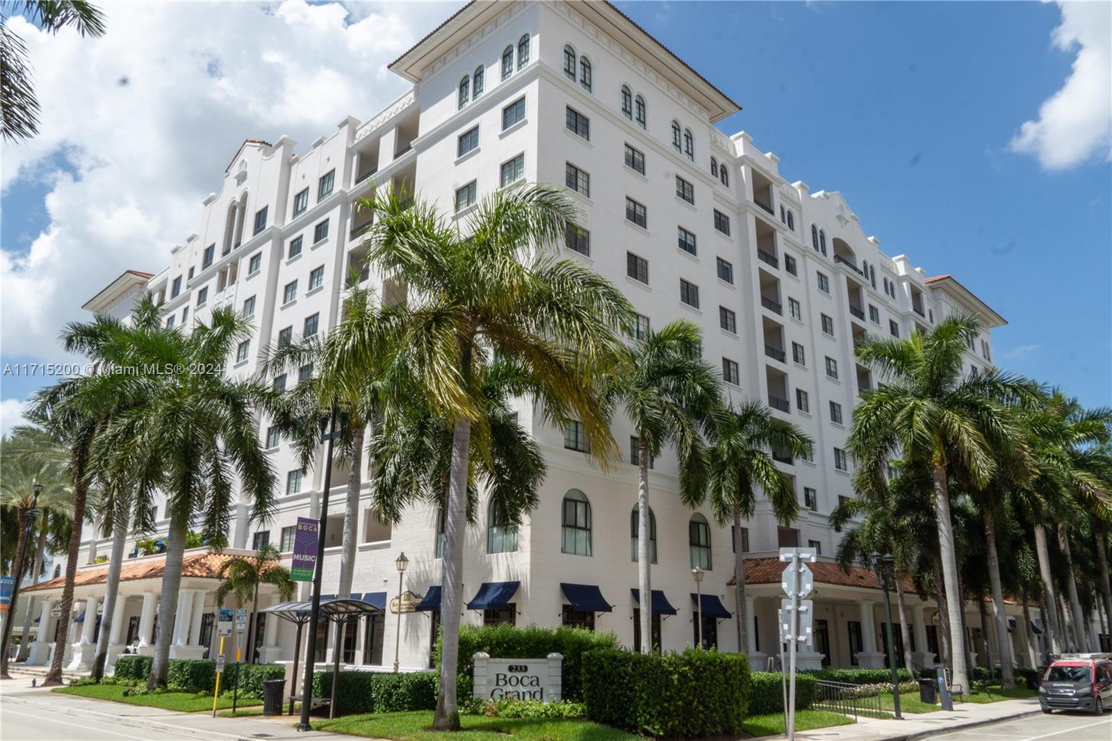 a view of a tall white building