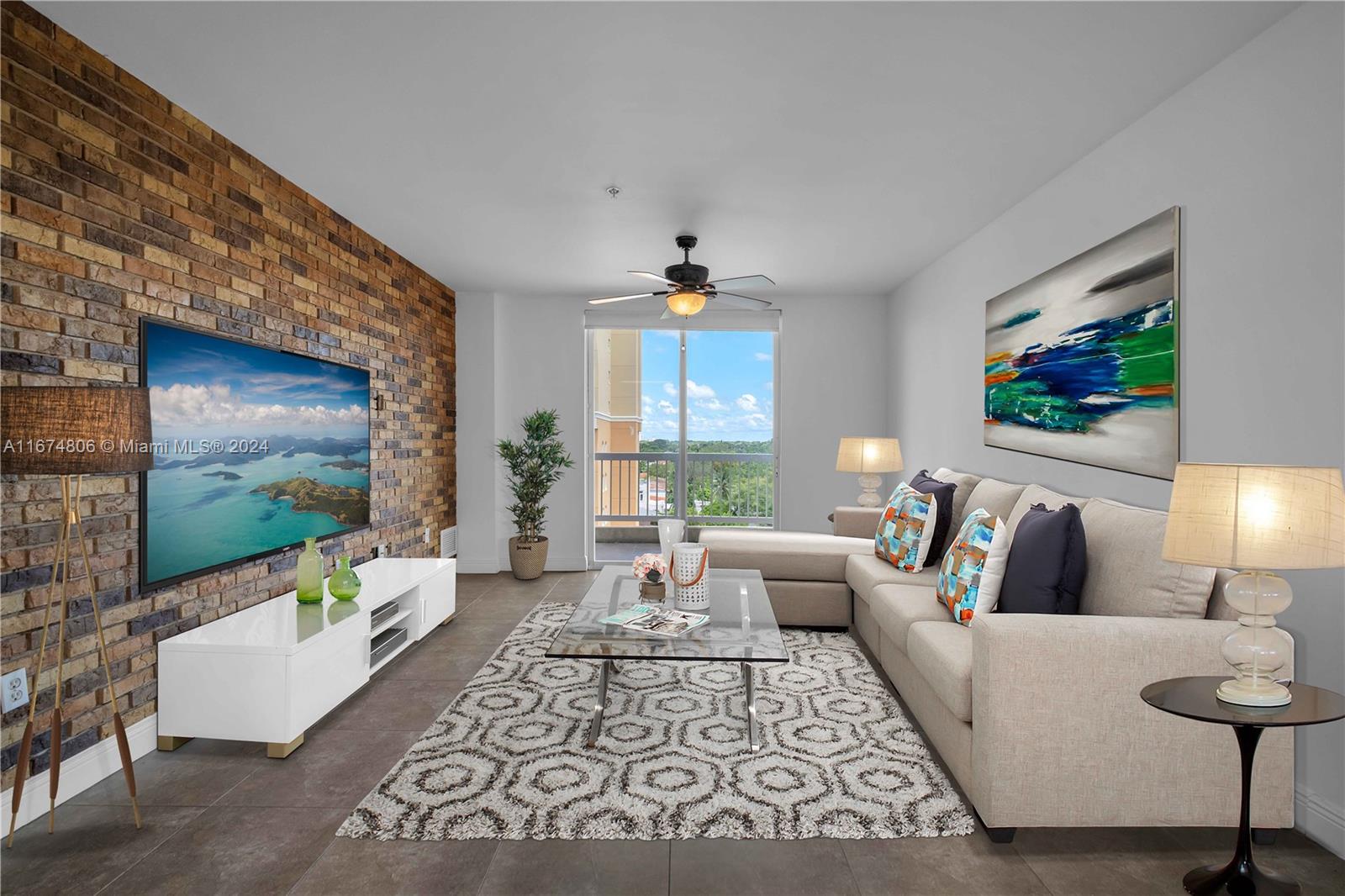 a living room with furniture and a flat screen tv