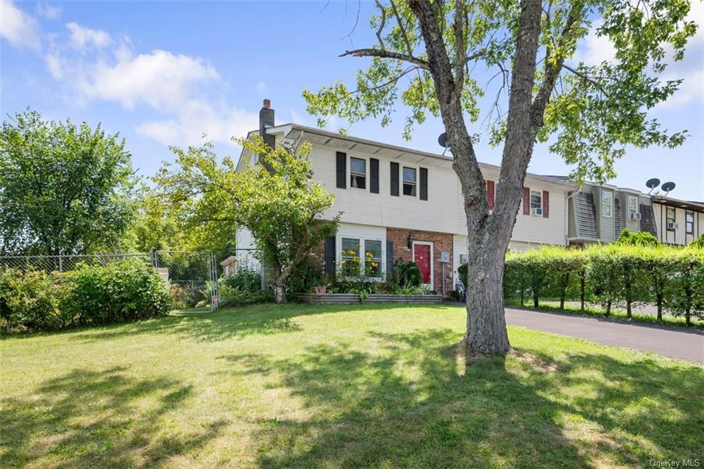 View of front of home featuring a front lawn