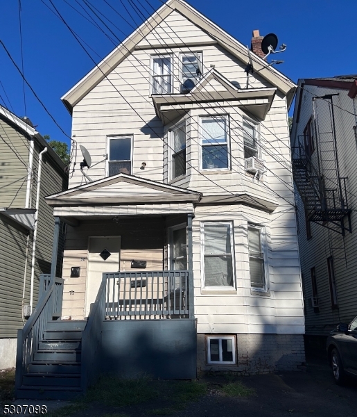 a view of a house with a balcony