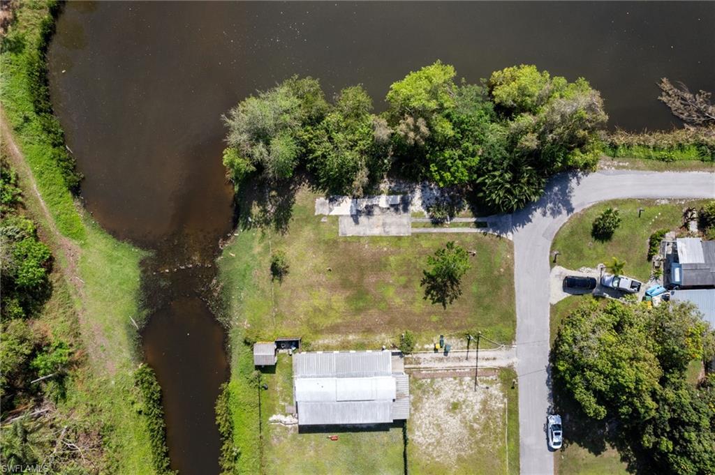 Aerial featuring waterviews on two side of the property.