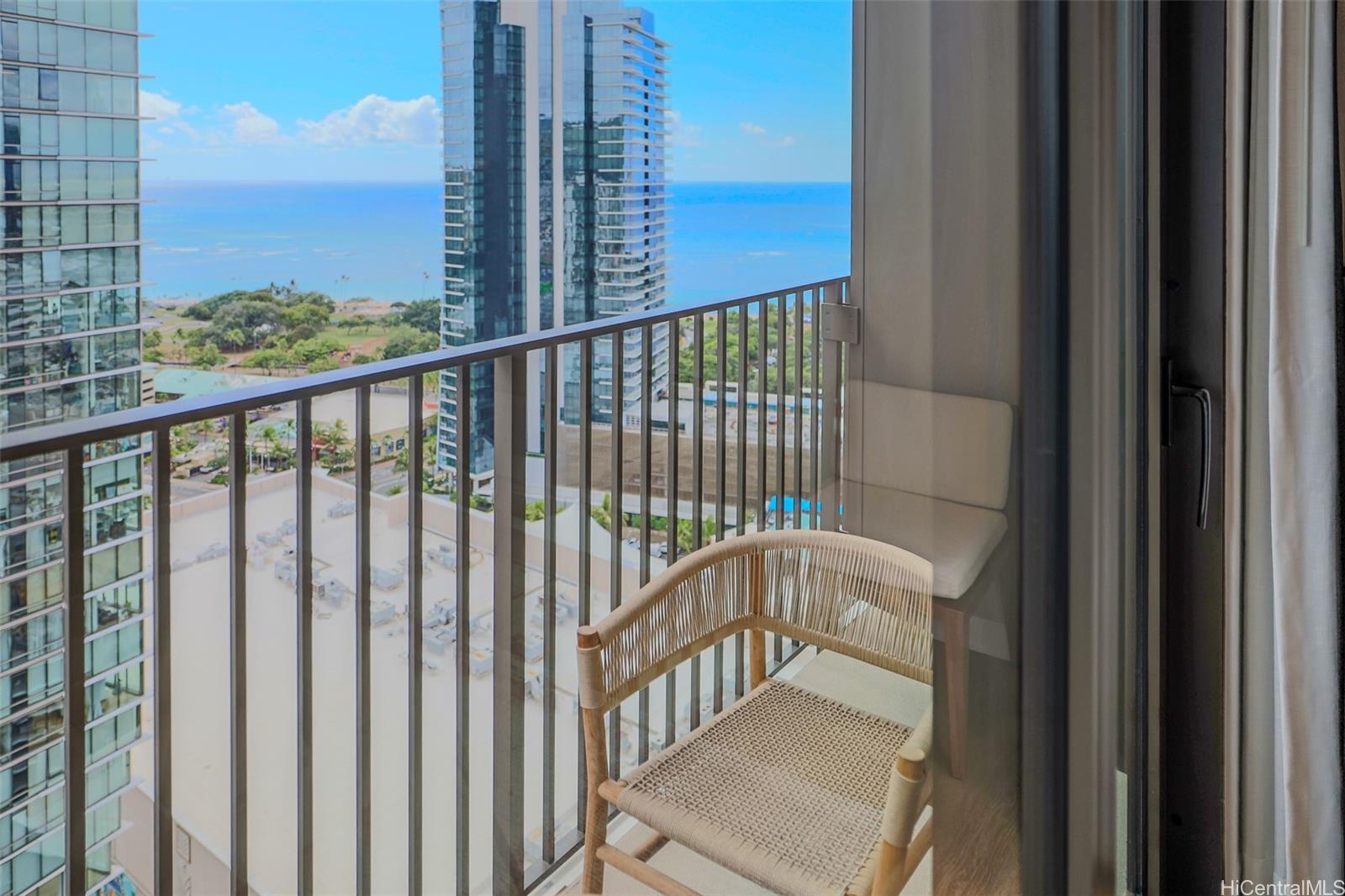 a view of a balcony with city view