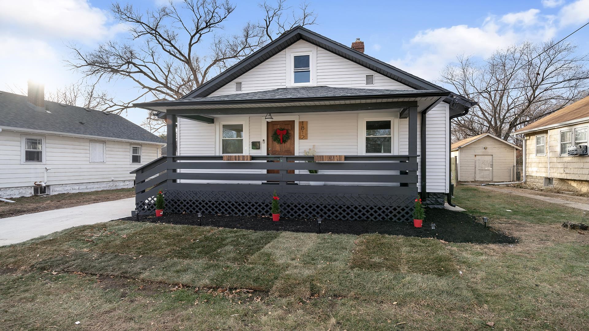 a front view of a house with a garage