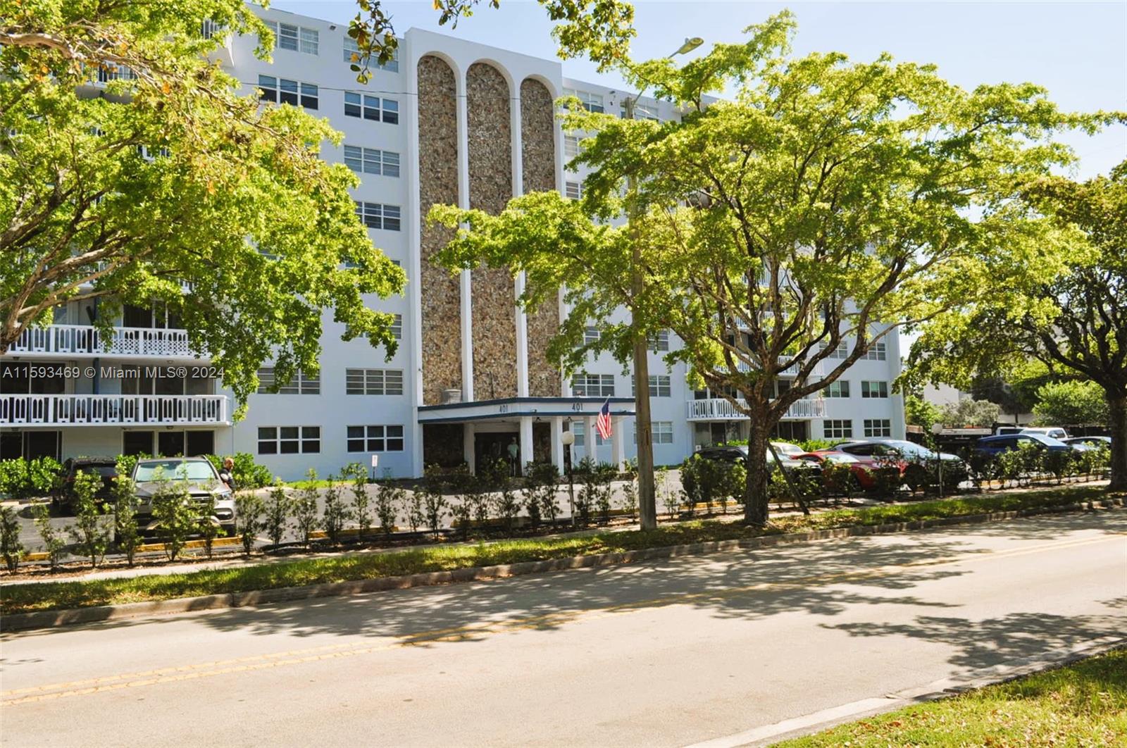 a front view of a building with street view