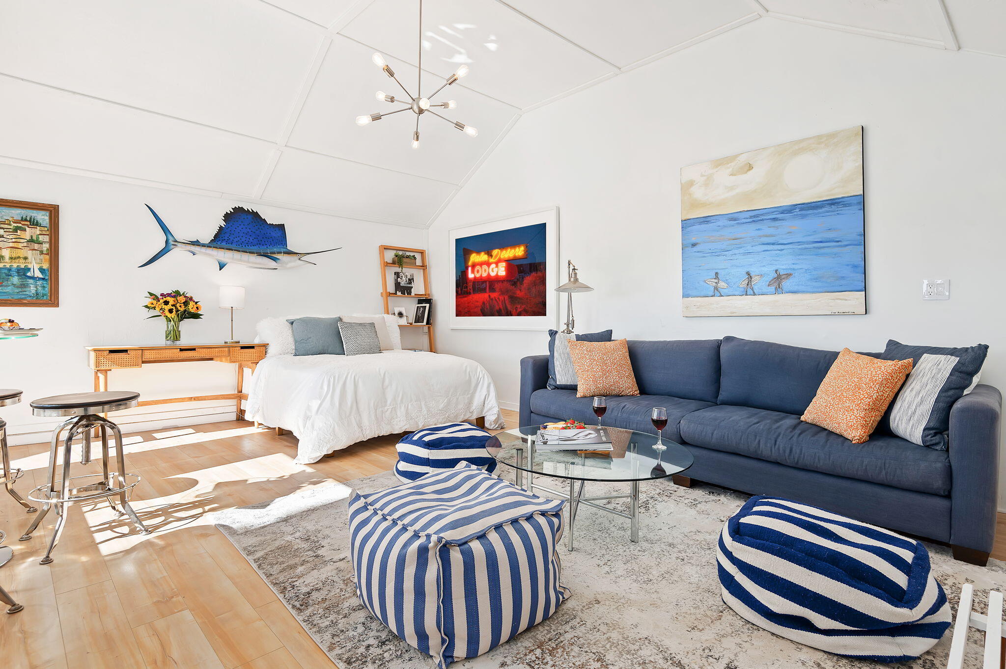 a bedroom with furniture and a ceiling fan