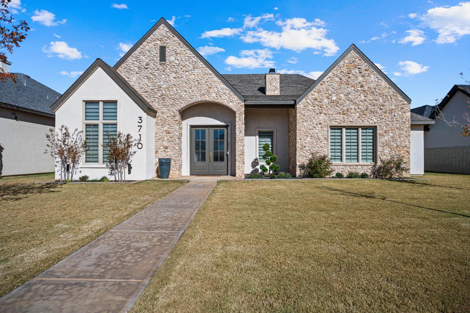 a view of a house with a patio