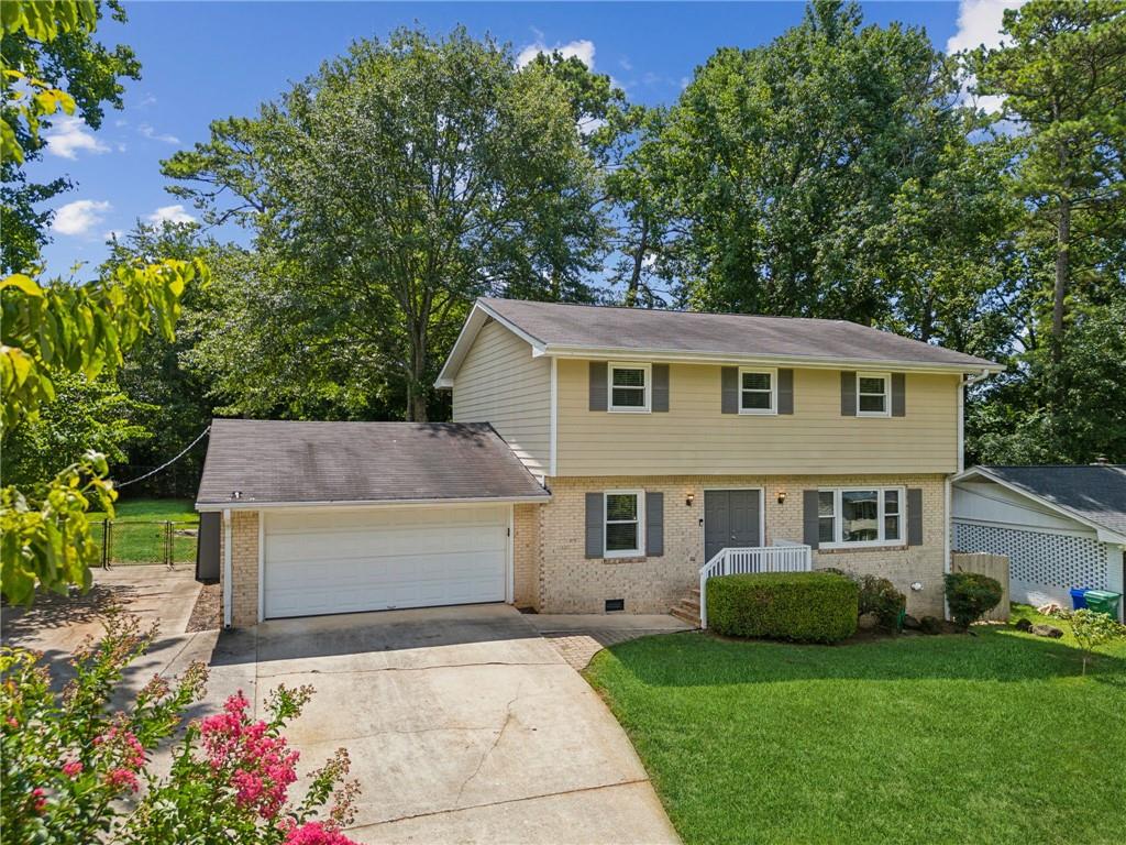 front view of a house with a yard