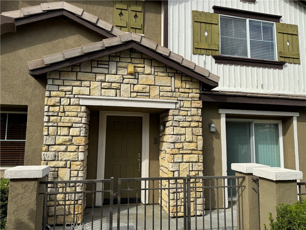 a front view of a house with a door