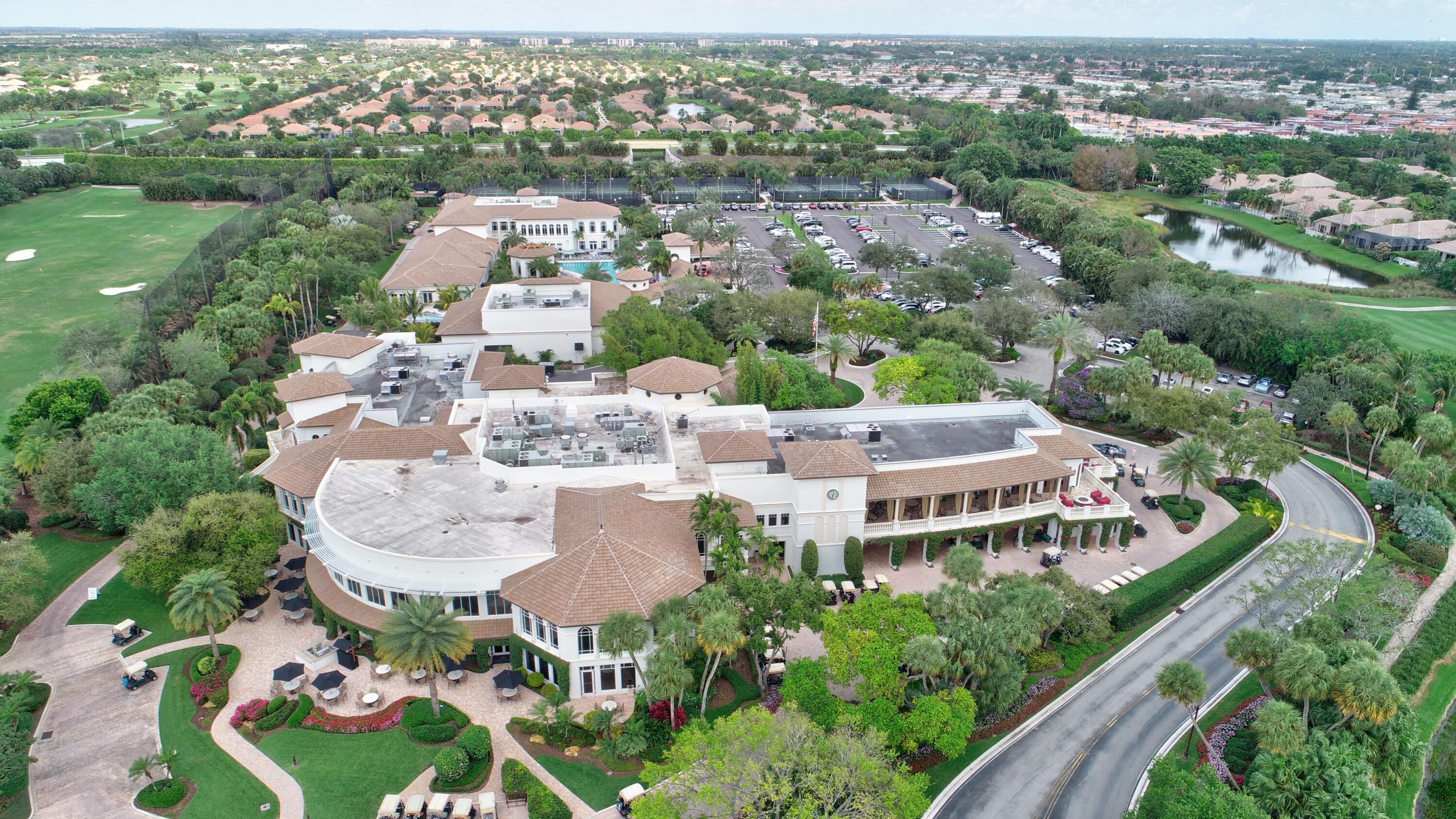 an aerial view of residential house with outdoor space and river