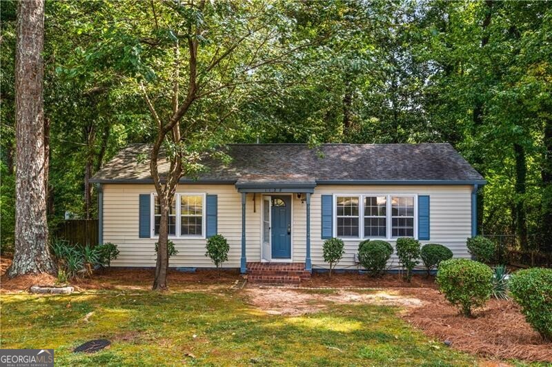 front view of a house with a yard