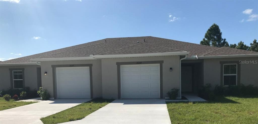 a front view of house with yard