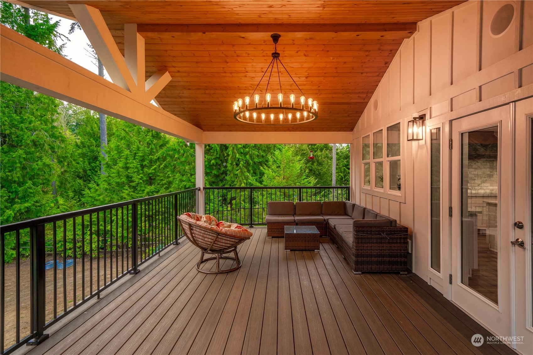 a view of two chairs in the balcony