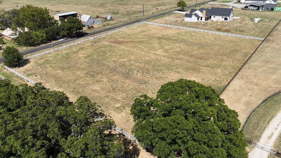 a view of a backyard of a house