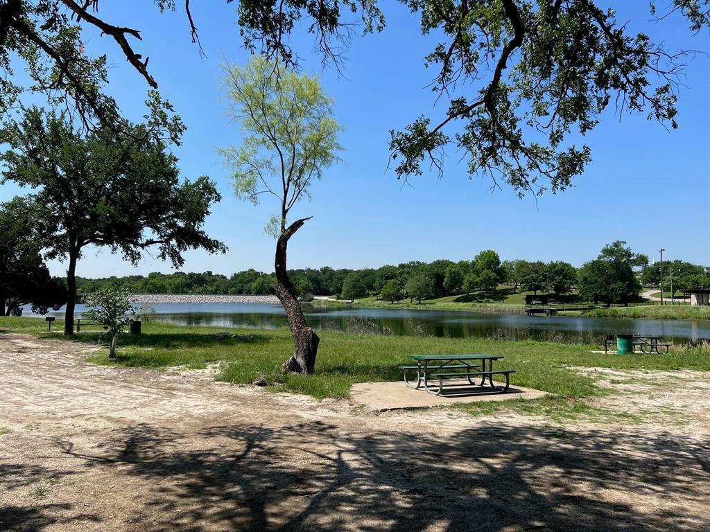 a view of a lake with a big yard