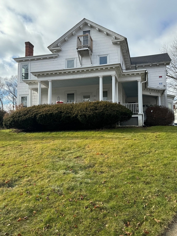 a view of a house with a garden