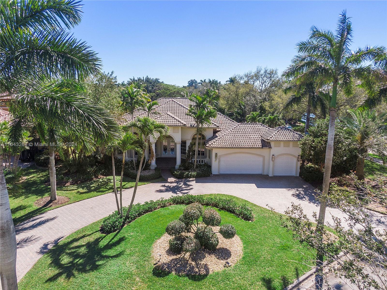 a view of a backyard with a patio