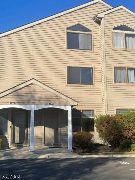 a view of house with yard