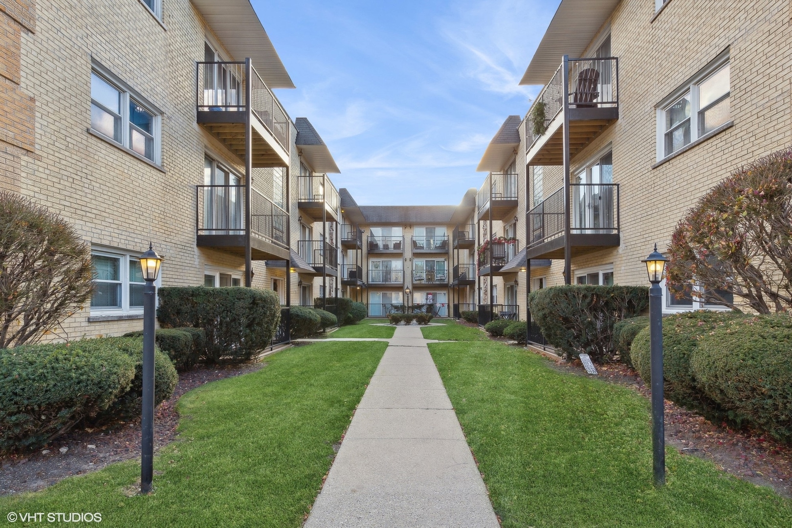 a view of a building with a yard