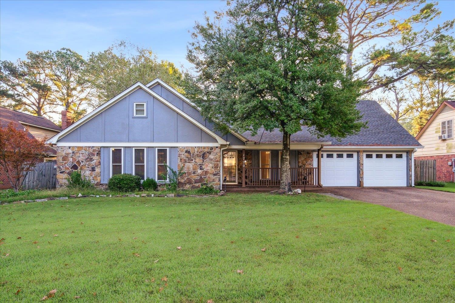 a view of a house with a big yard