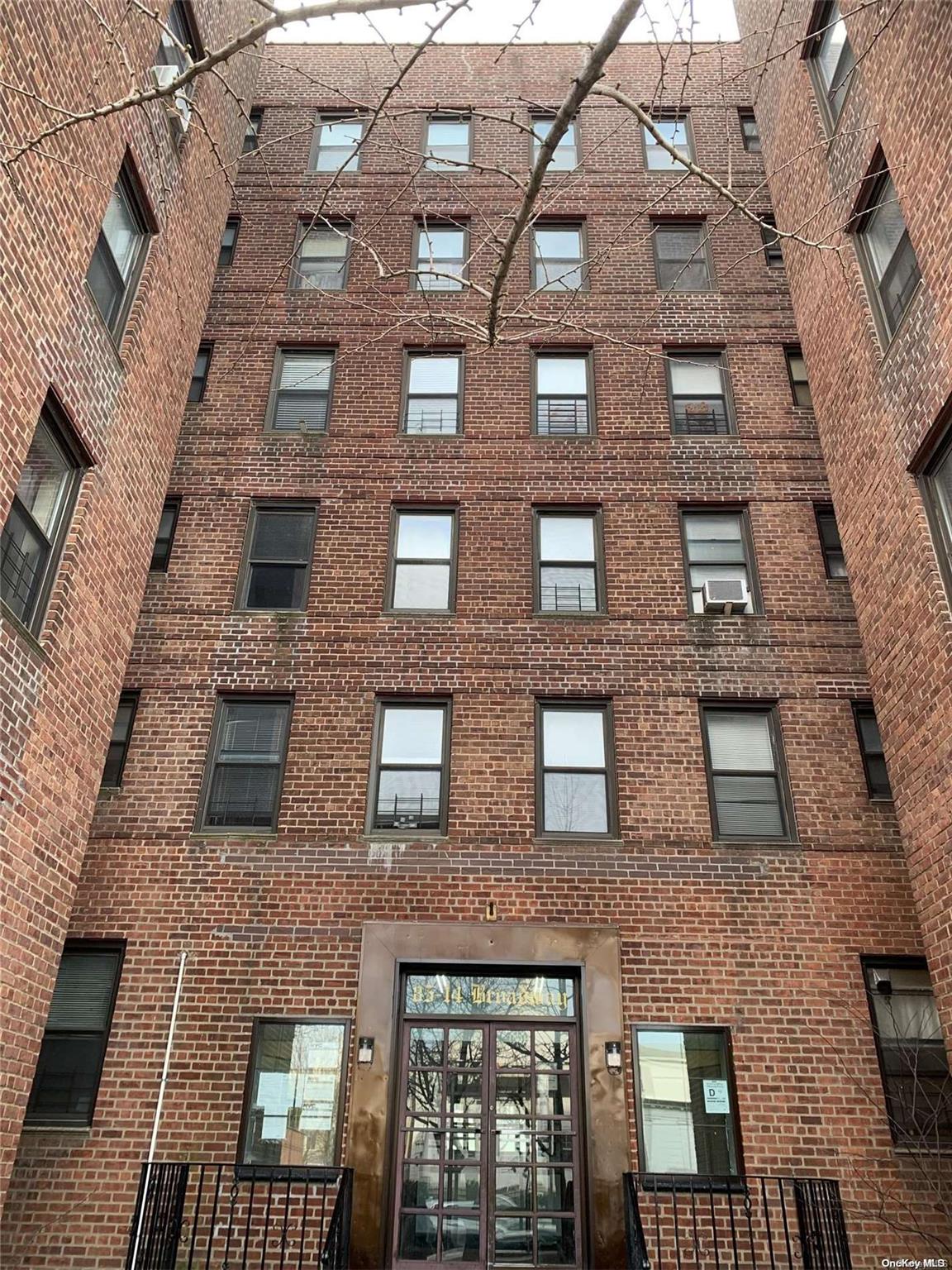 a building view with a brick wall