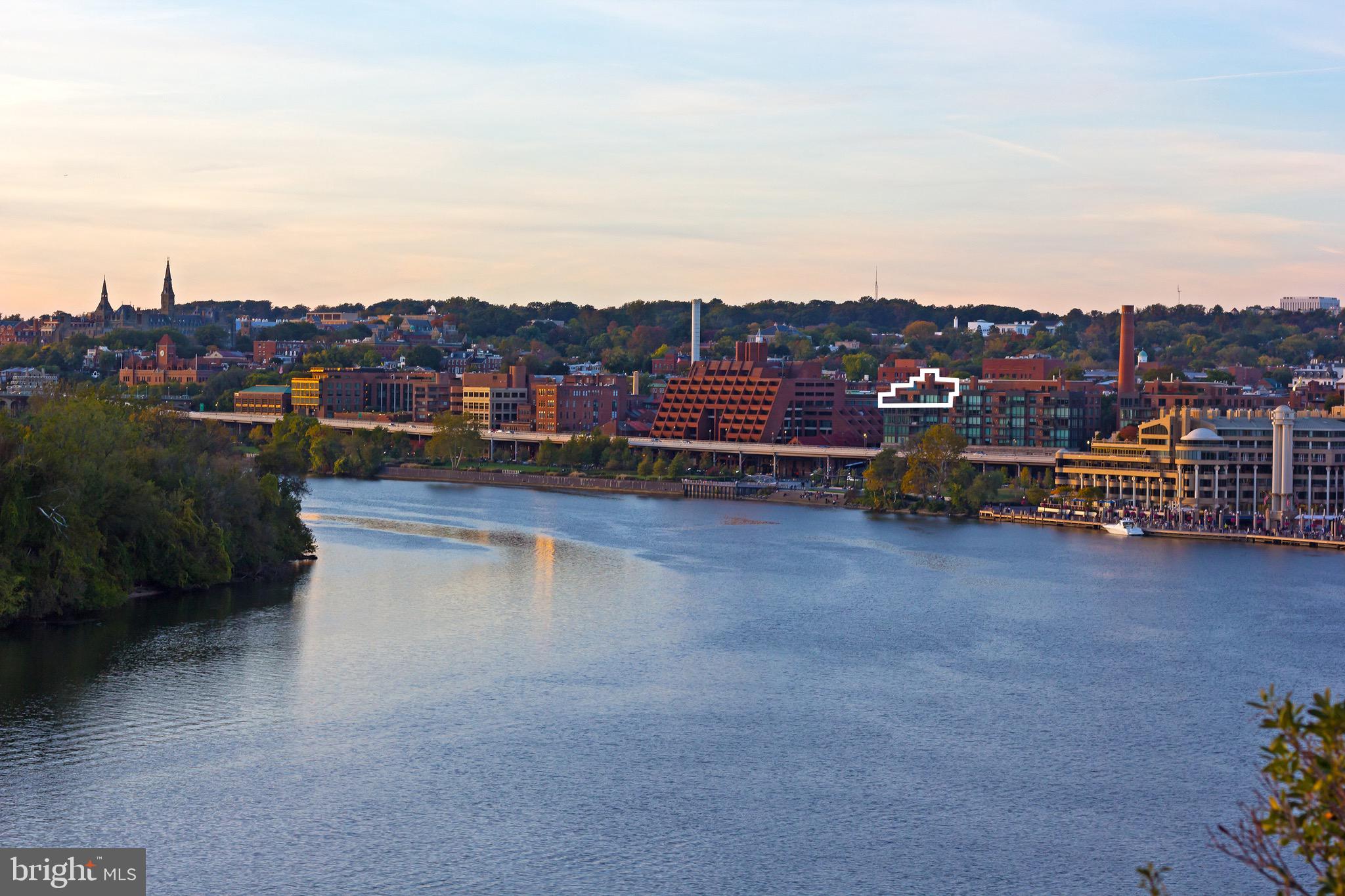 a view of a lake with city