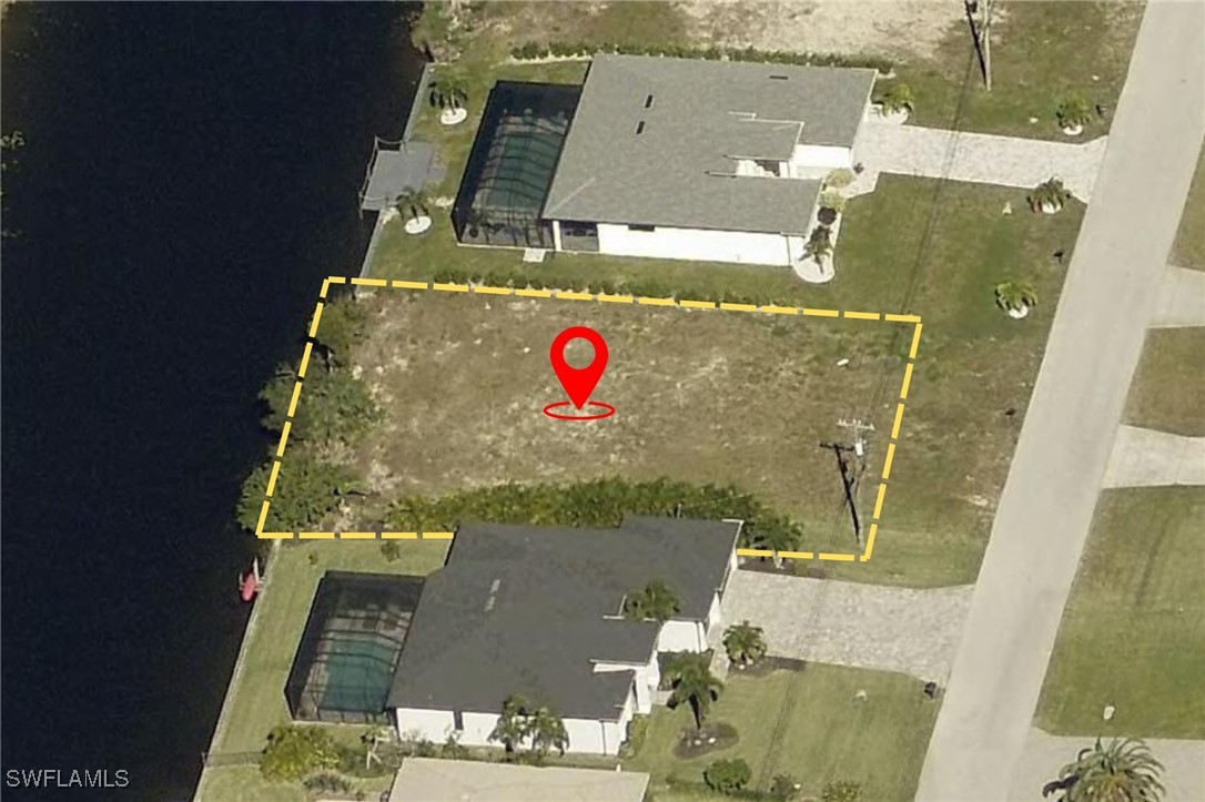 an aerial view of residential house with outdoor space