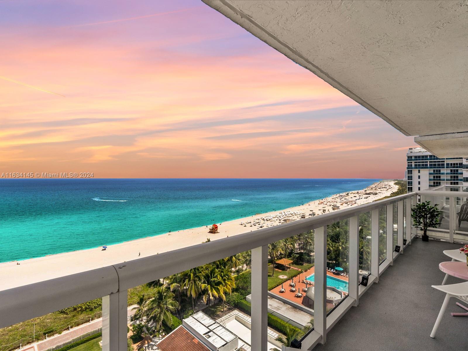 a view of a balcony with an ocean view