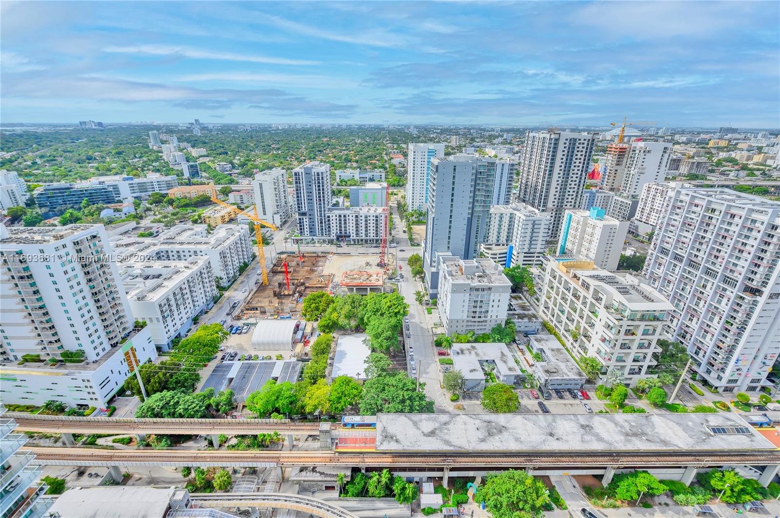 a view of a city and a yard