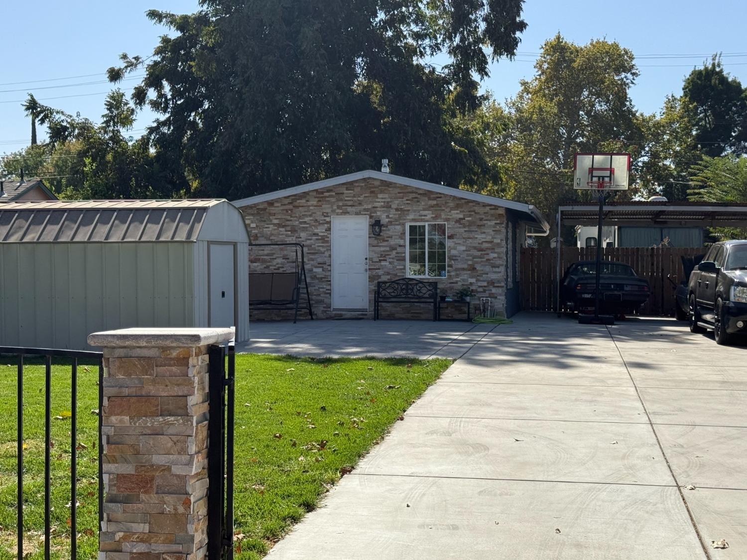 a view of a house with backyard tub and couches