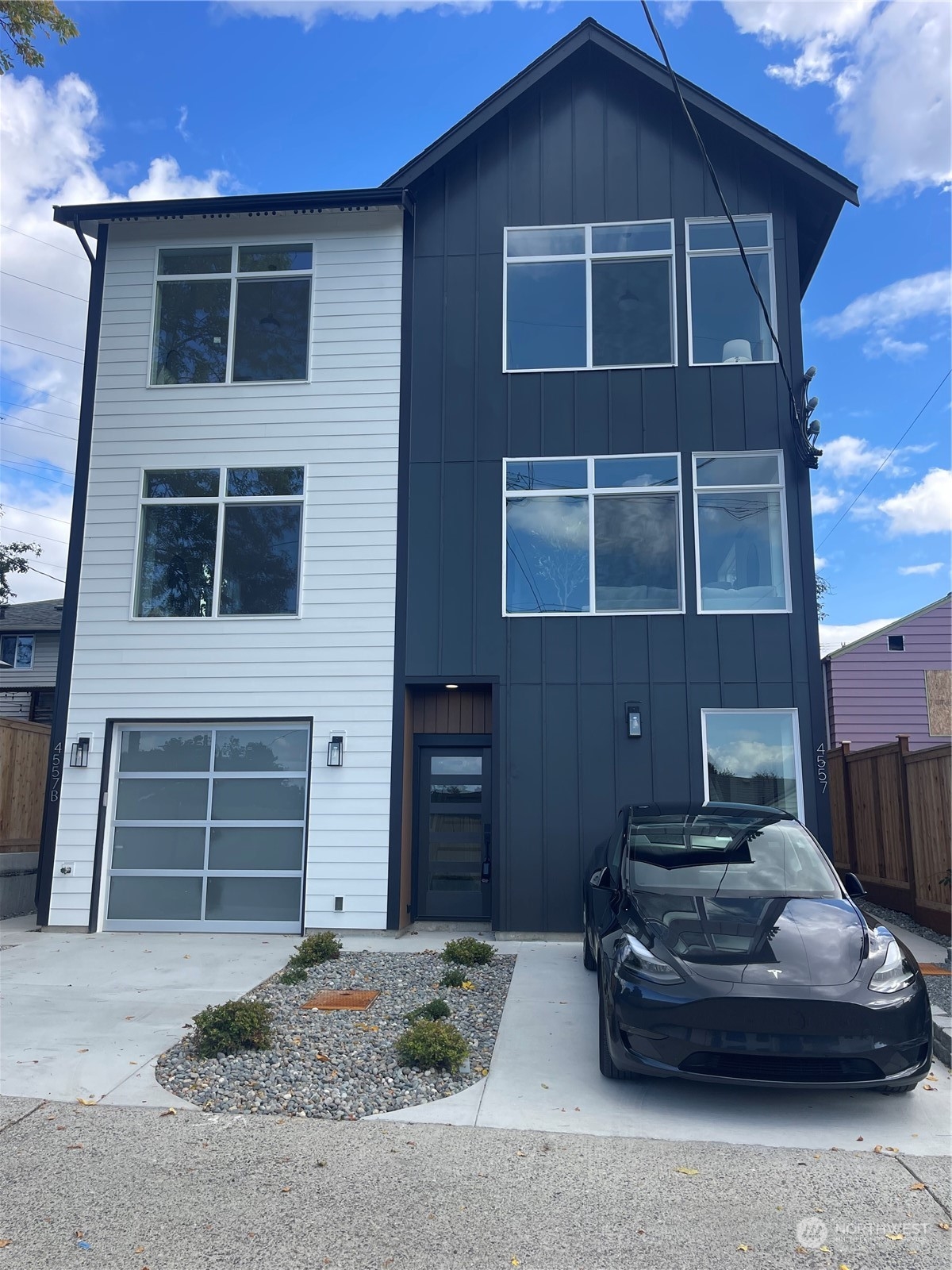 a car parked in front of a house