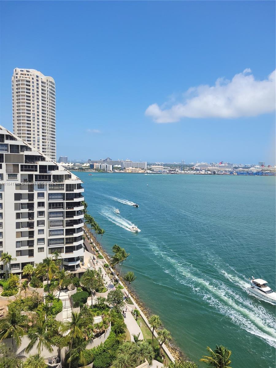 a view of a city with tall buildings in the background