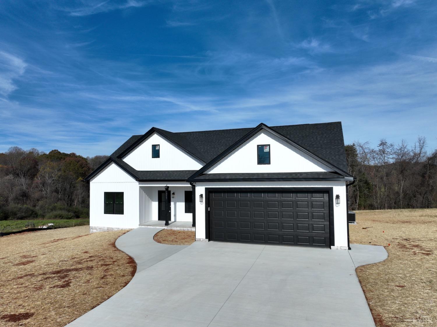 a front view of a house with yard