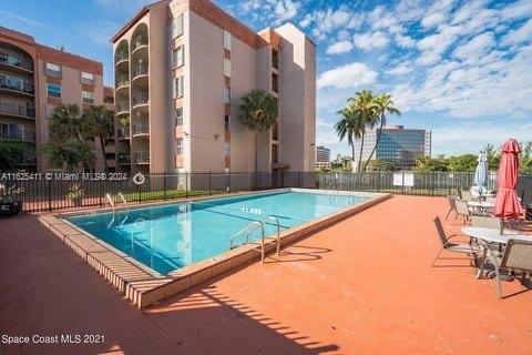 a swimming pool with outdoor seating and yard