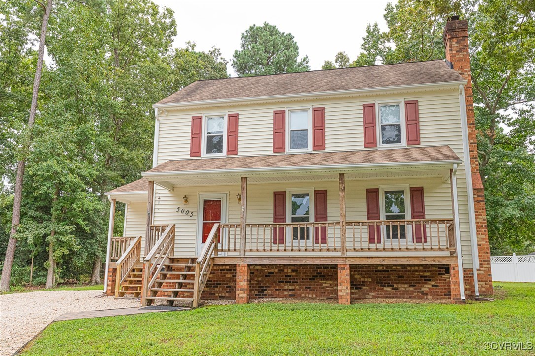 front view of a house with a yard