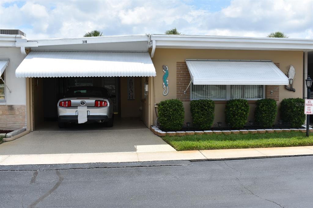 a car parked in front of garage