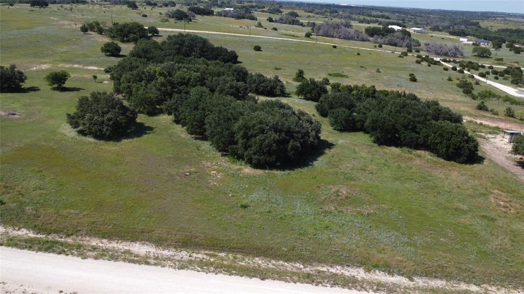 an aerial view of beach and yard