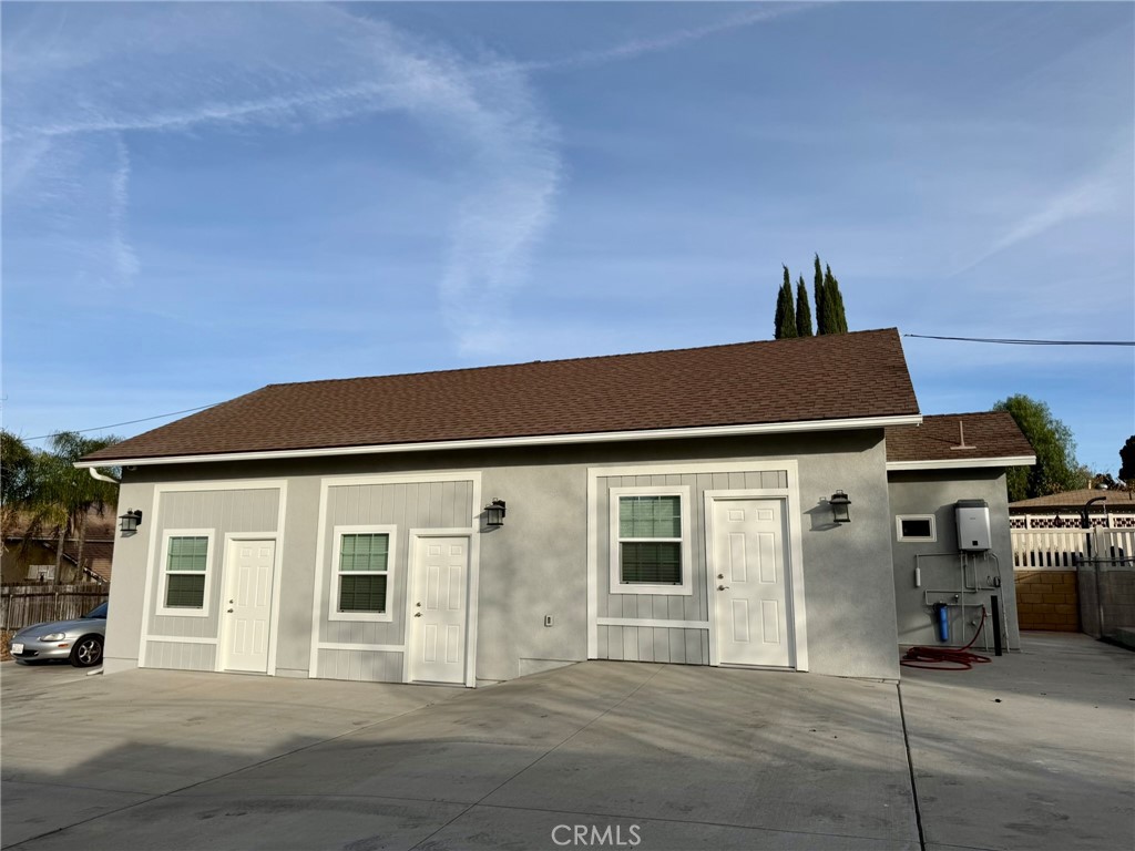 a front view of a house with a garage