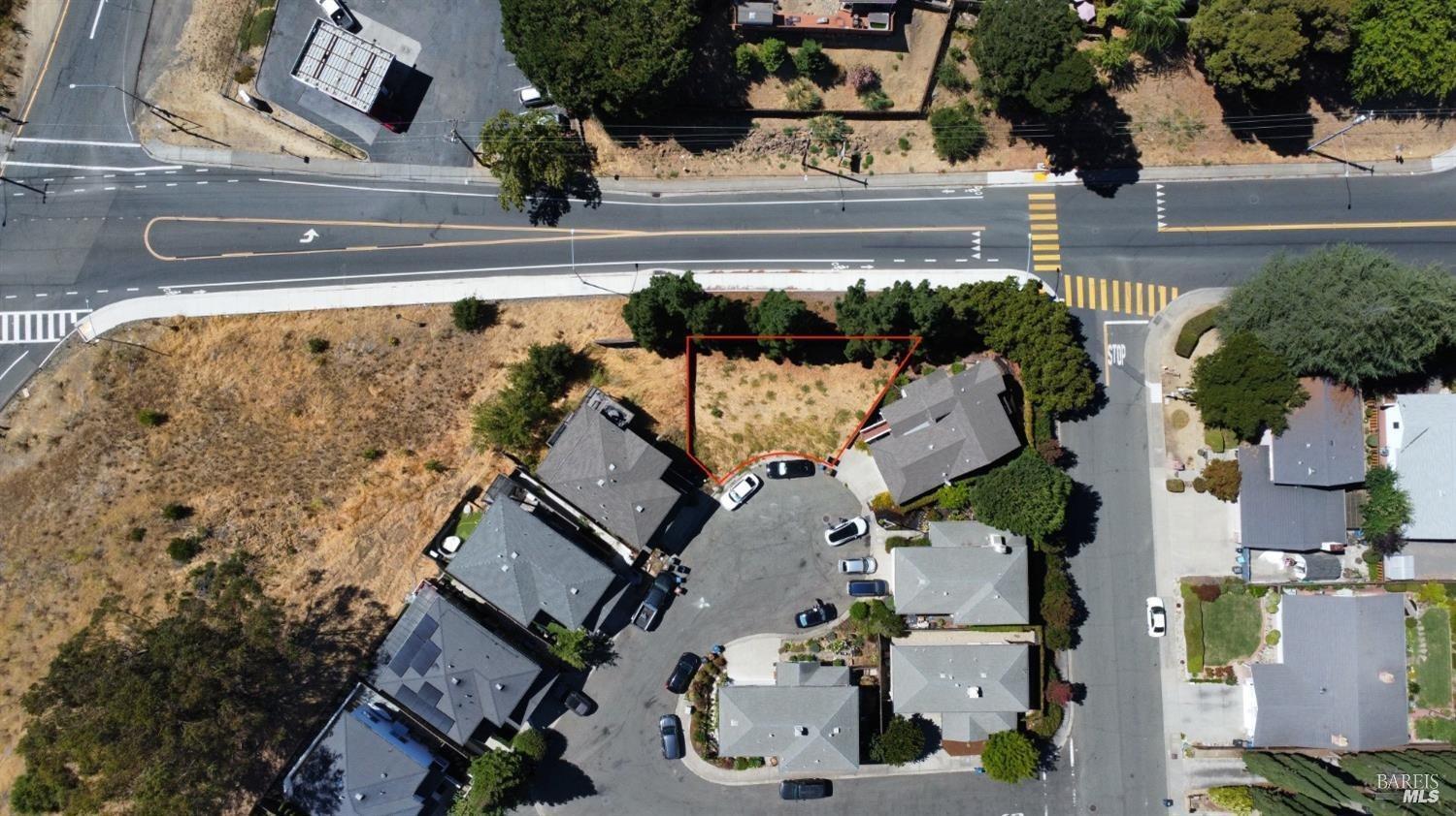 an aerial view of houses with outdoor space