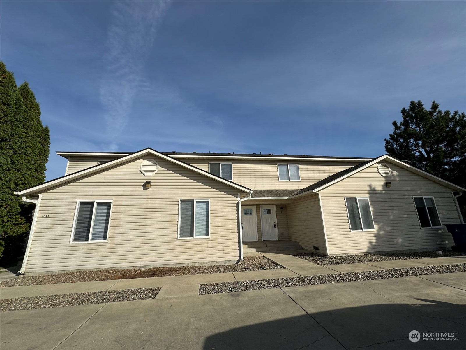 a front view of a house with windows