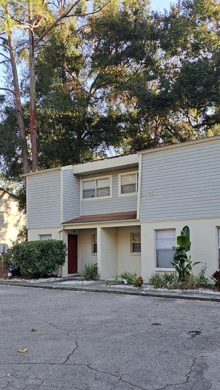 front view of a house with a street