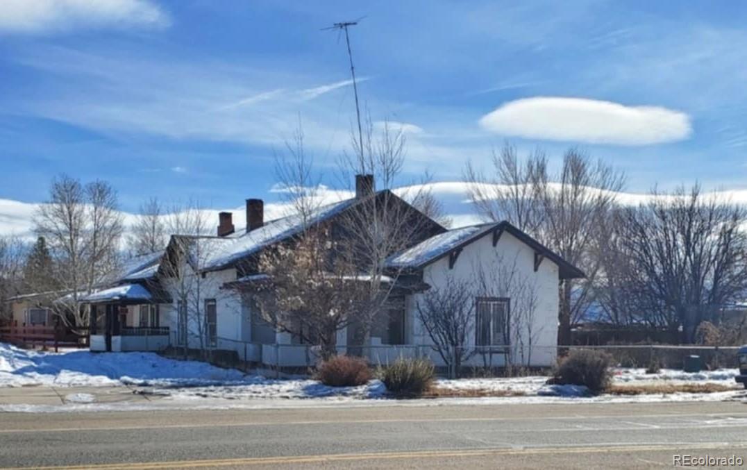 a view of a house with a street