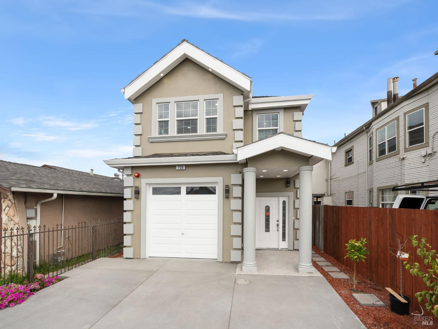 a view of a house with a garage