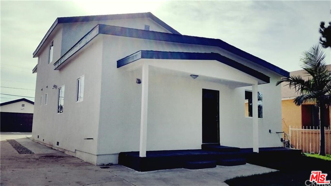 a front view of a house with balcony