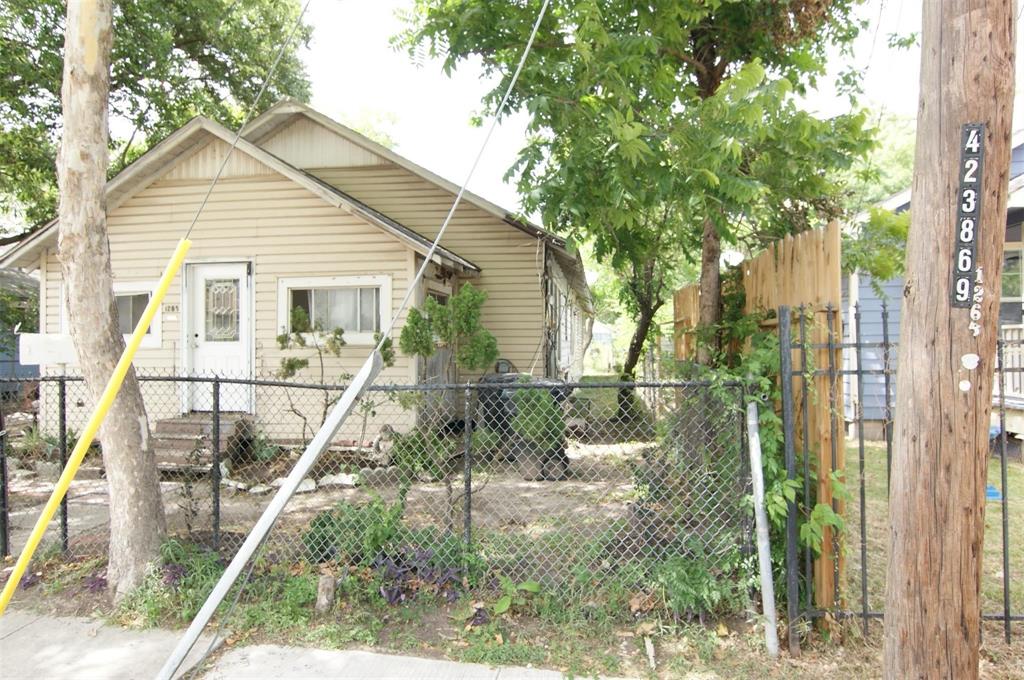 The photo showcases a spacious 5000 sq. ft. lot, offering ample room for two modern townhomes to be constructed side by side.