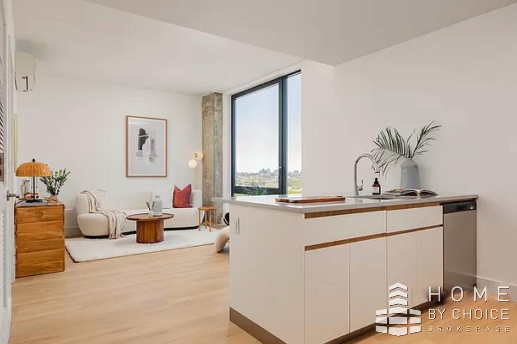 a living room with furniture and window