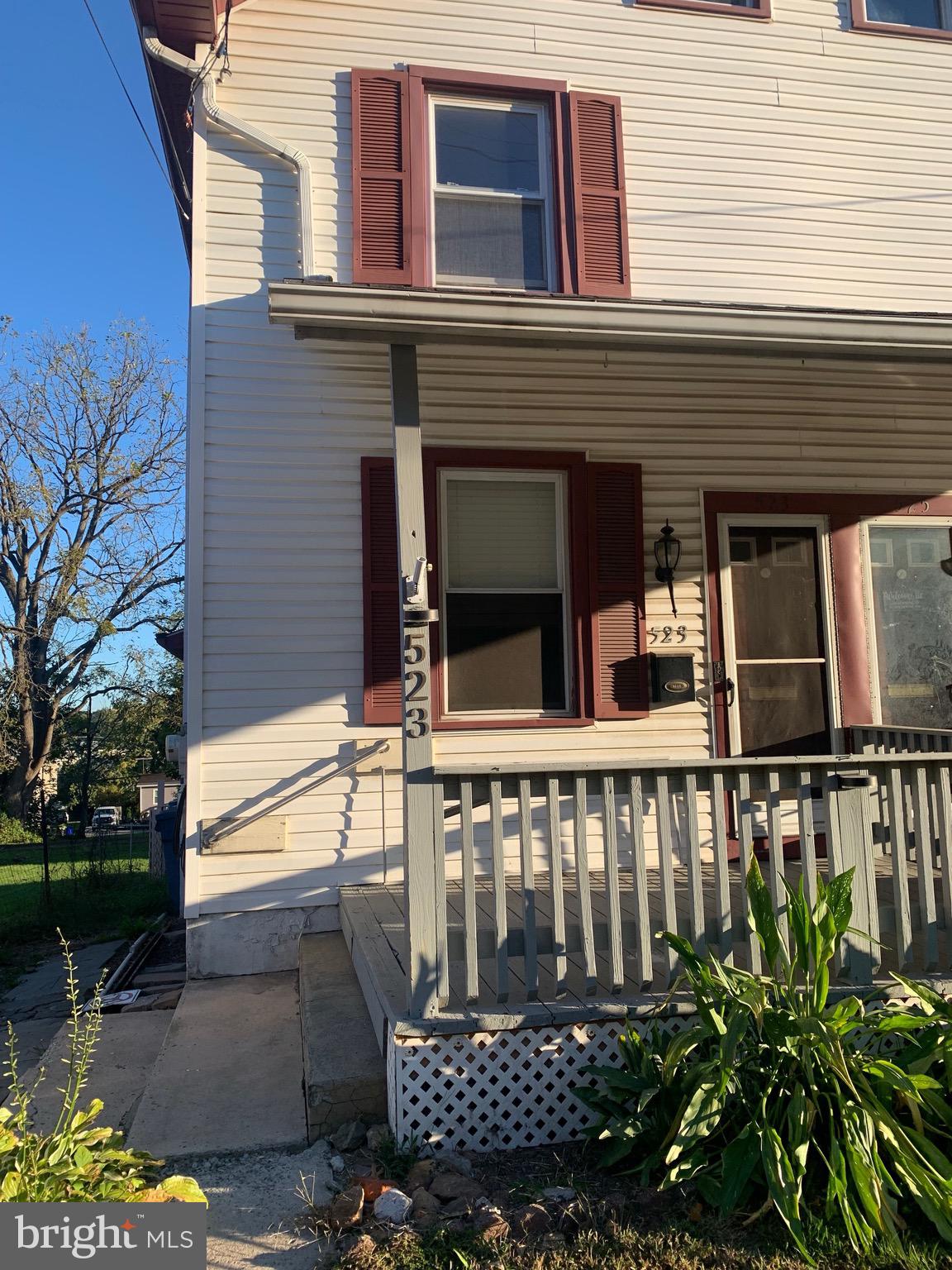 front view of a house with a balcony