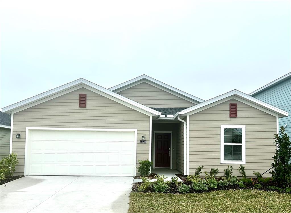 a view of a house with garage