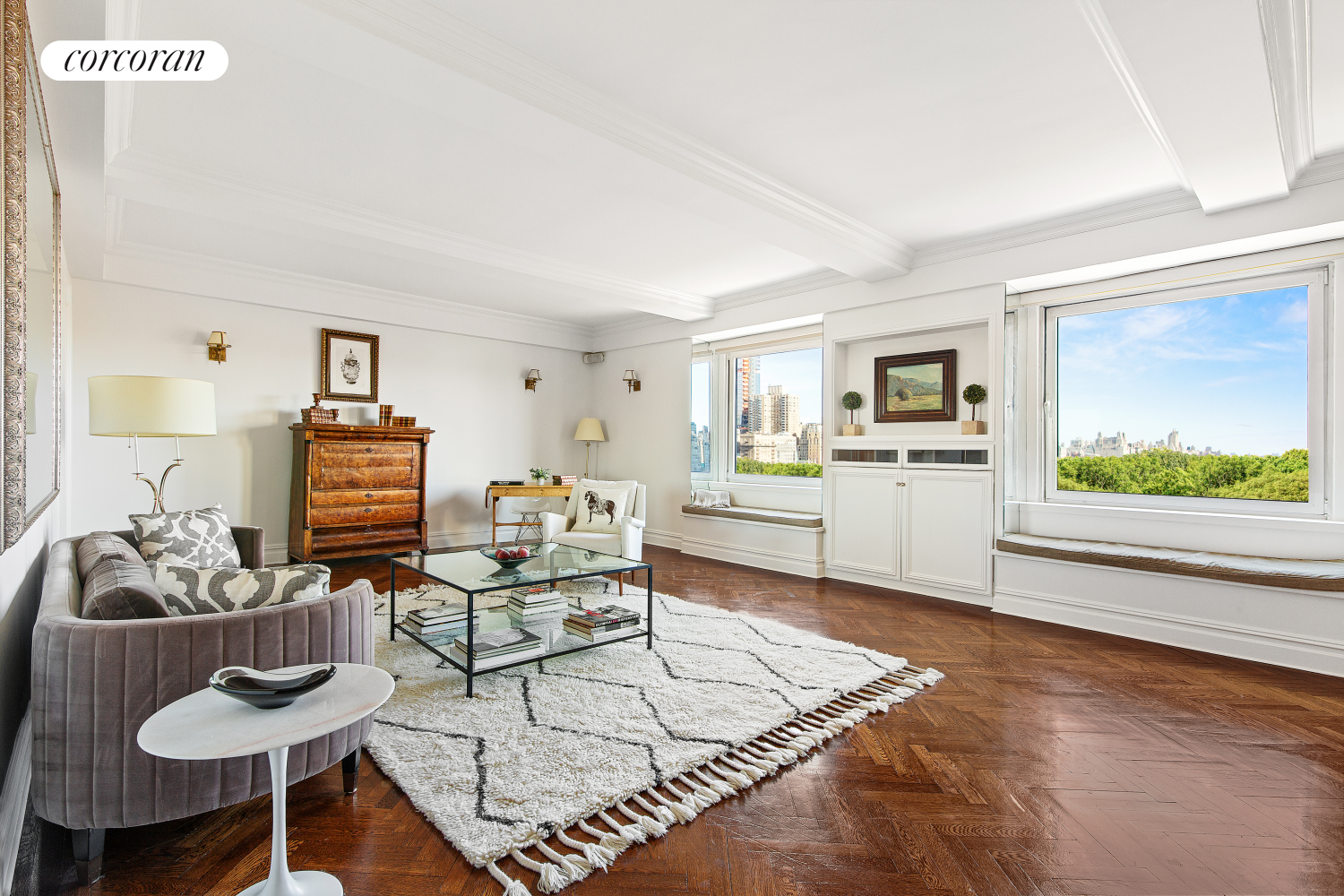 a living room with furniture and view of kitchen