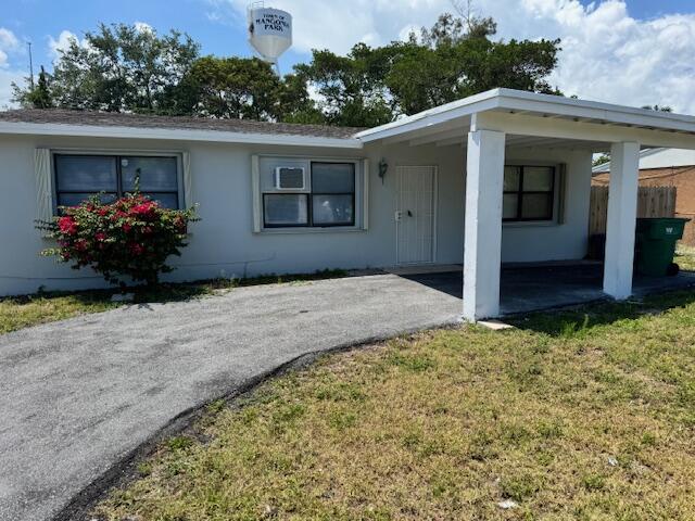 a front view of house with yard